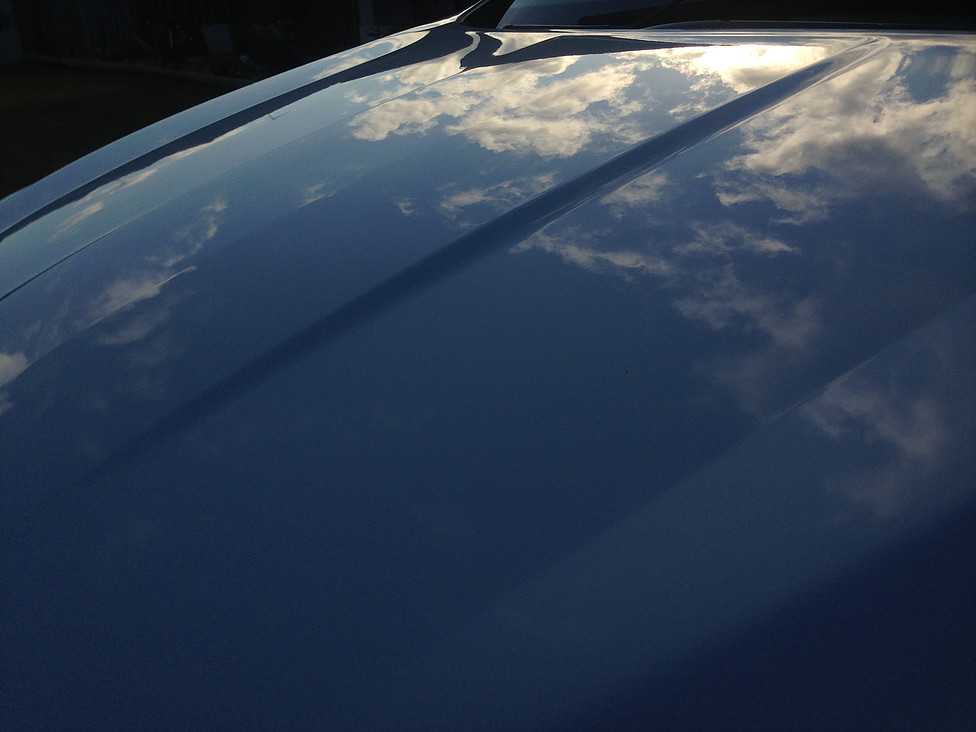Reflection in the bonnet of the clouds - High Gloss Mirror effect